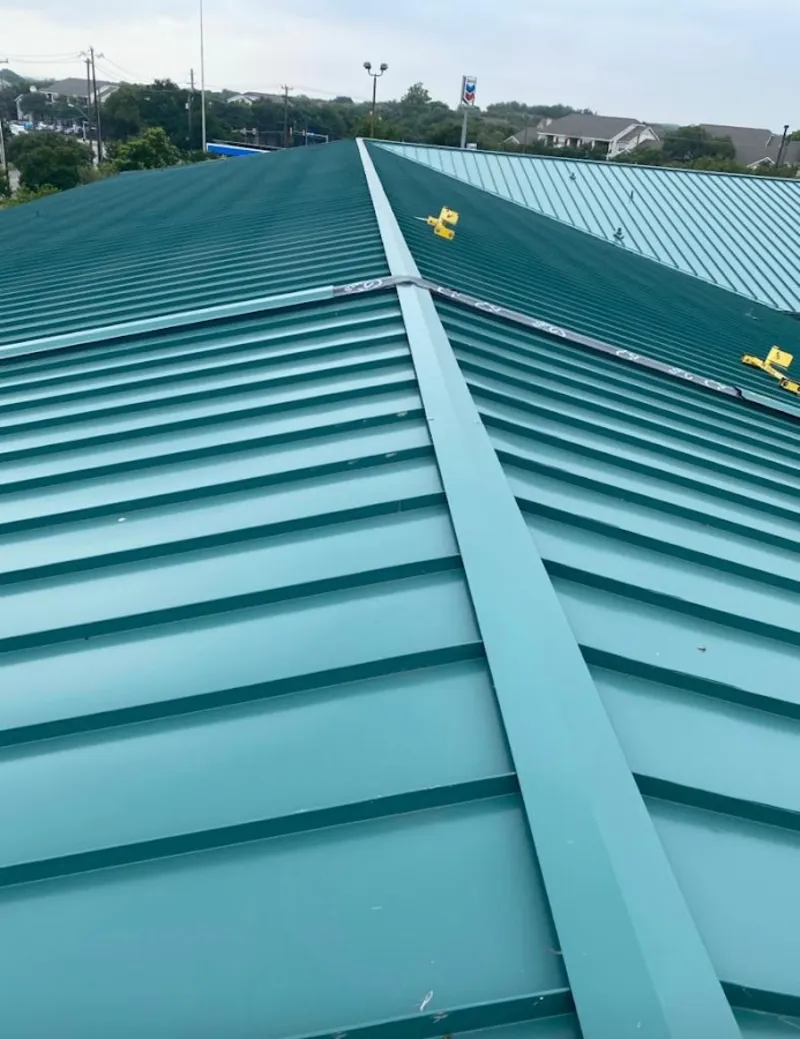 Green commercial metal roof ridge and valley for Metal Roof Repair in Fruitland Park